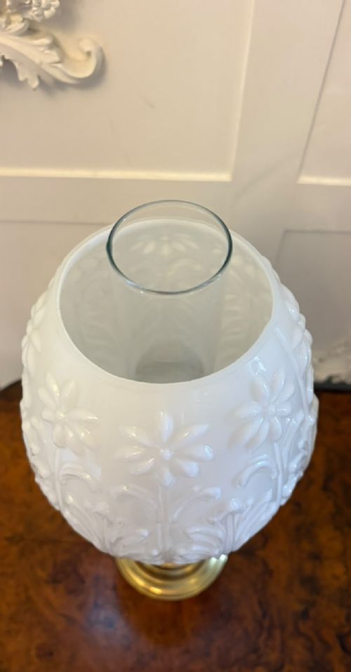 fig 1. A near pair of Edwardian brass oil lamps featuring moulded white opaline glass shades and clear glass chimneys.