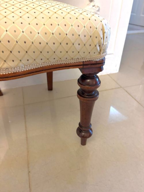 fig 3. A set of four antique Victorian mahogany dining chairs featuring open balloon-shaped backrests, turned front legs, and cream patterned upholstery.