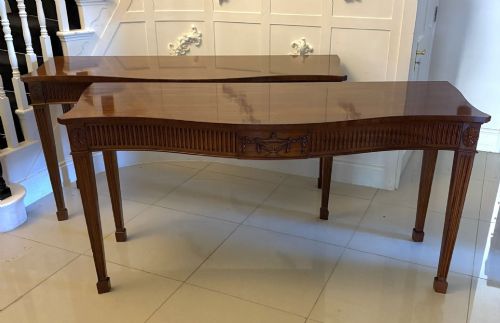 Antique Mahogany Pair of Serpentine Serving Console Tables with Neoclassical Carving