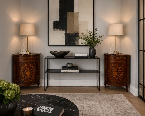 fig 1. A pair of Victorian mahogany corner cabinets featuring curved bow fronts with floral urn marquetry inlays and tapered square feet.