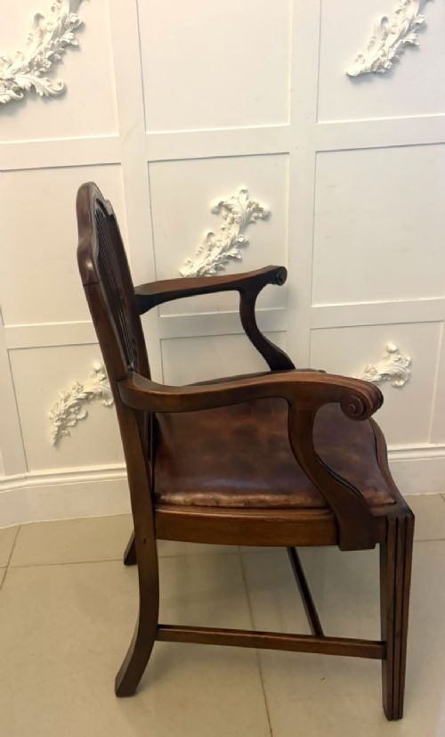 fig 3. A set of eight Victorian mahogany Hepplewhite style dining chairs with carved shield backs and tan leather seats.