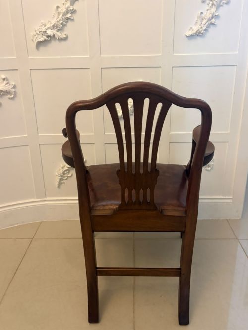 fig 4. A set of eight Victorian mahogany Hepplewhite style dining chairs with carved shield backs and tan leather seats.