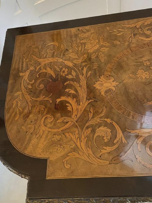 An antique French ebonised and walnut marquetry fold-over card table with gilt bronze mounts and fluted legs. View VII