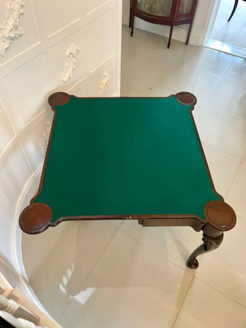 fig 1. An 18th-century George II mahogany fold-over card table with carved cabriole legs, shell knees, and a central frieze drawer.