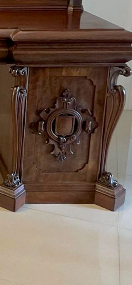 A large William IV mahogany sideboard featuring an ornate carved splashback upstand and two pedestal cupboards with carved scrollwork. View II