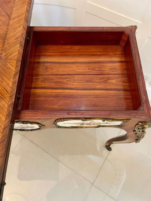 fig 5. A Victorian Louis XV Revival kingwood console card table featuring a serpentine fold-over top, cabriole legs, gilt bronze mounts, and inset painted porcelain plaques.