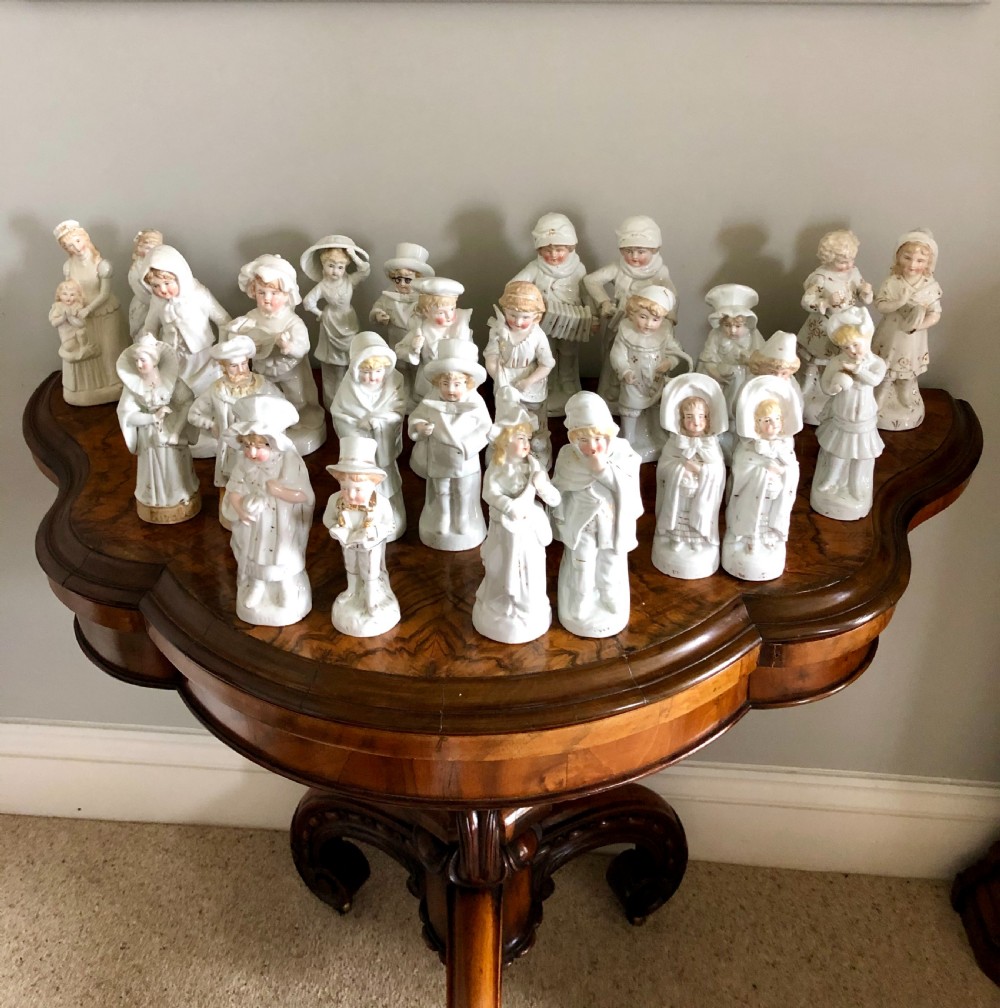  Set of 24 Antique Continental Porcelain Figurines 
