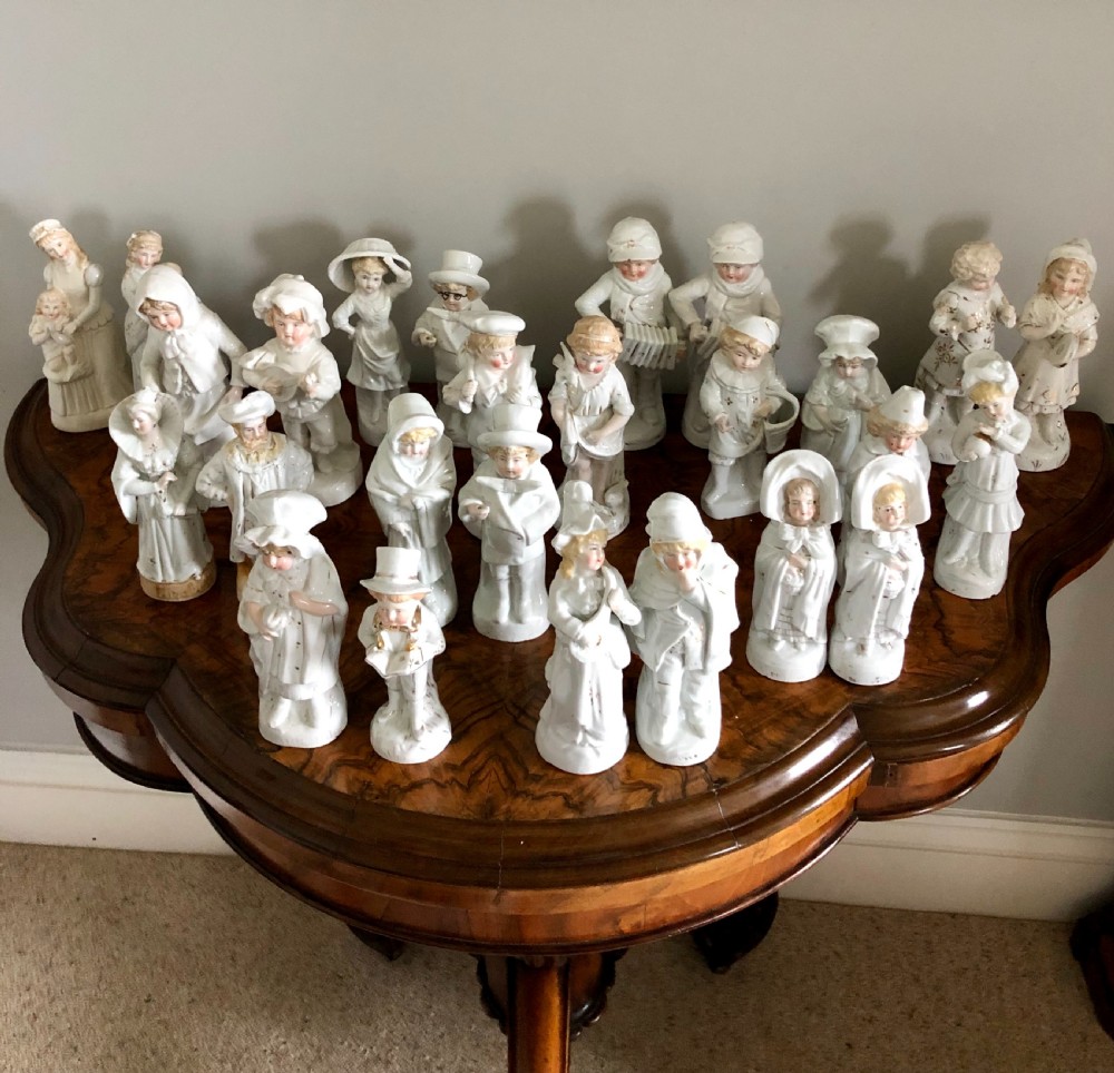  Set of 24 Antique Continental Porcelain Figurines 
 View XVII