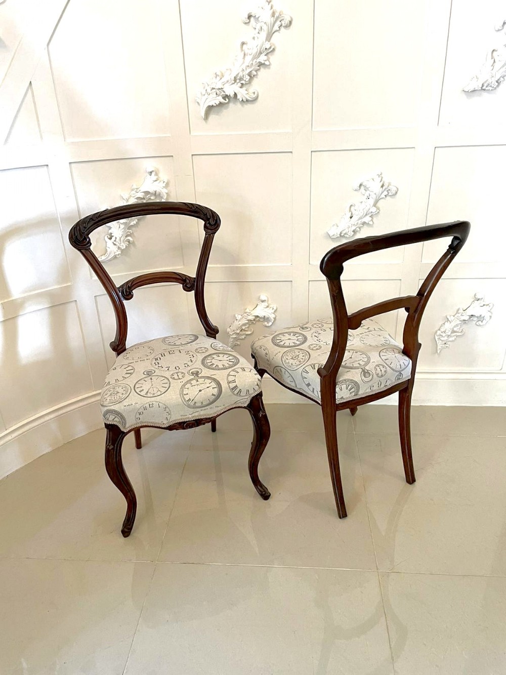 Exceptional quality pair of antique Victorian carved rosewood side chairs