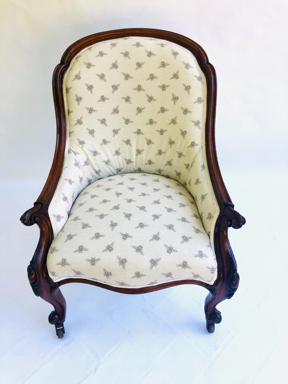 Fine Quality Antique Rosewood Victorian Armchair in Bumble Bee Fabric View II