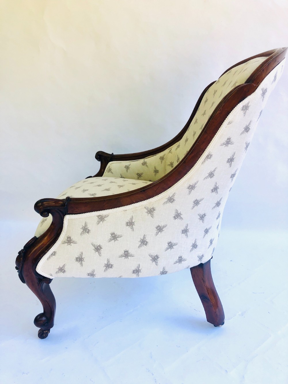 Fine Quality Antique Rosewood Victorian Armchair in Bumble Bee Fabric View III