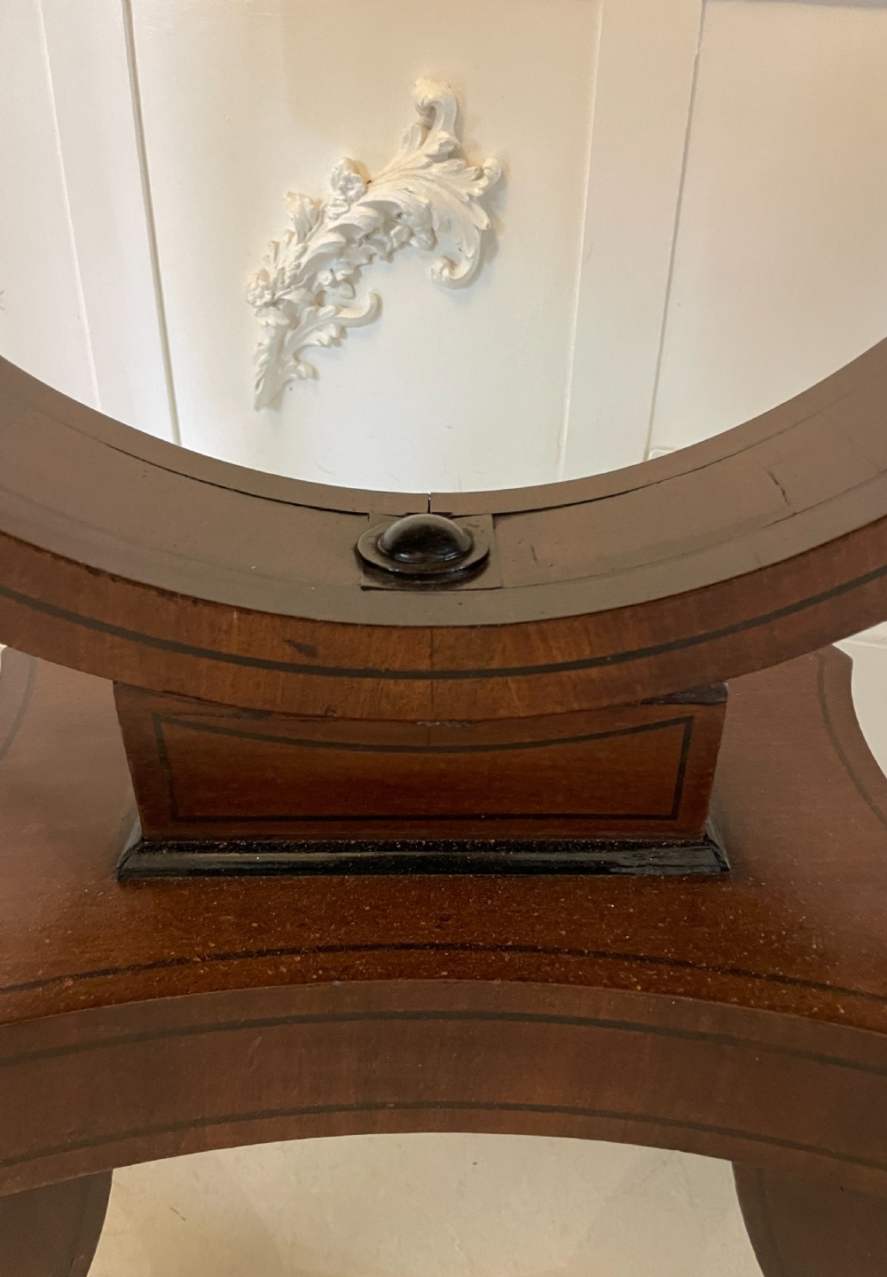 A Regency mahogany fold-over card table featuring crossbanded inlay, a central pedestal base, and four splayed legs with brass paw castors. View VII