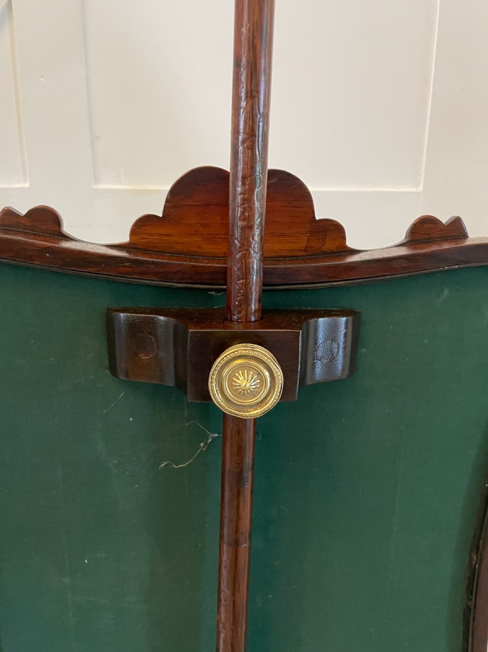 An antique Victorian carved rosewood pole screen featuring a framed tapestry panel depicting a pastoral scene, mounted on an adjustable central column with a tripod base. View II