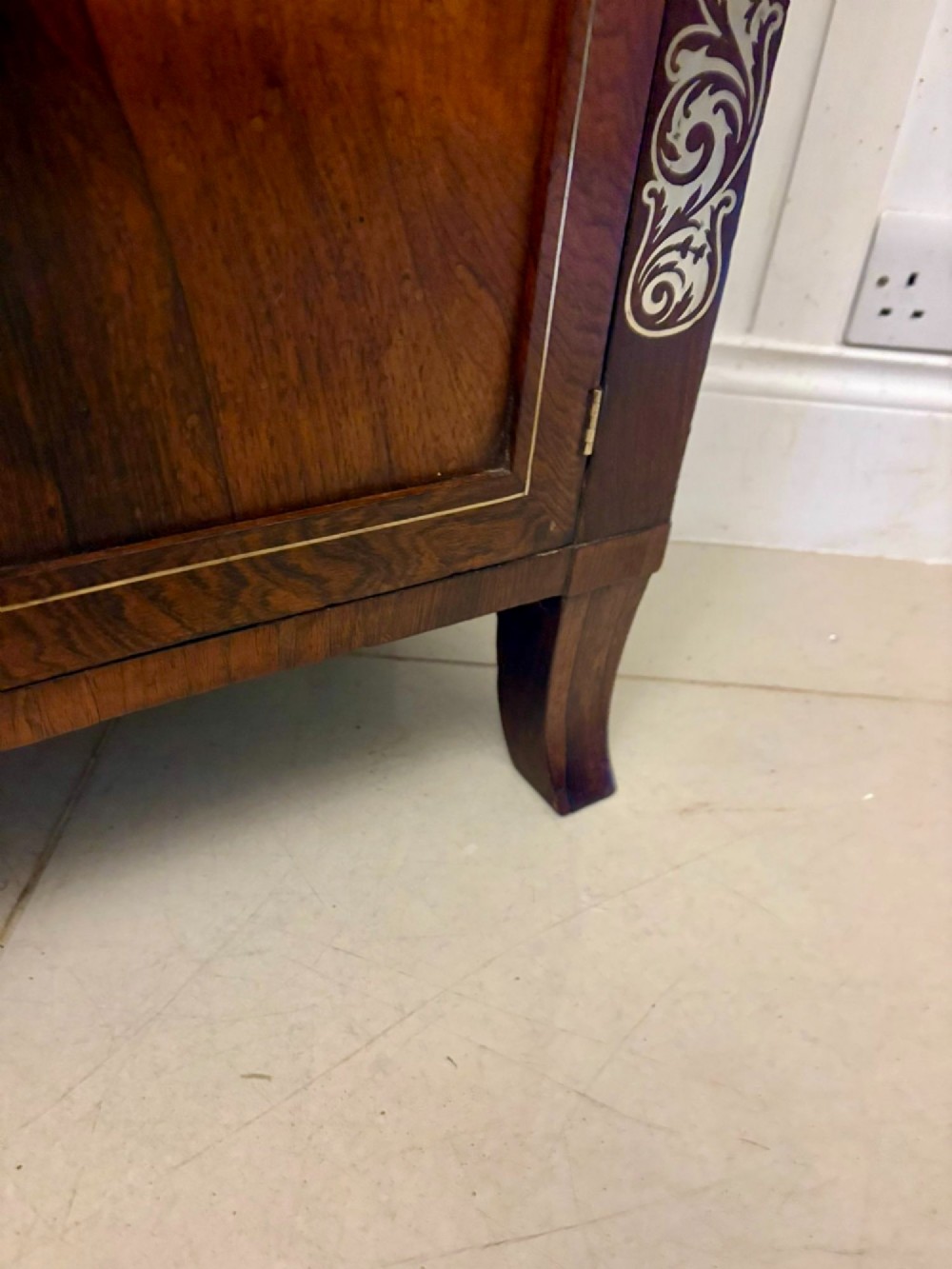 An antique Regency mahogany chiffonier side cabinet featuring intricate floral brass inlay on the doors and frieze with an upper open shelf. View II