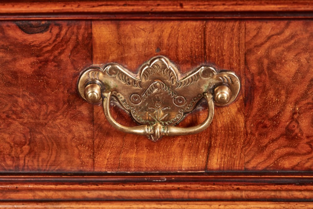 A Victorian burr walnut bureau writing desk featuring a fall-front flap, internal drawers, brass handles, and carved cabriole legs ending in paw feet. View IV