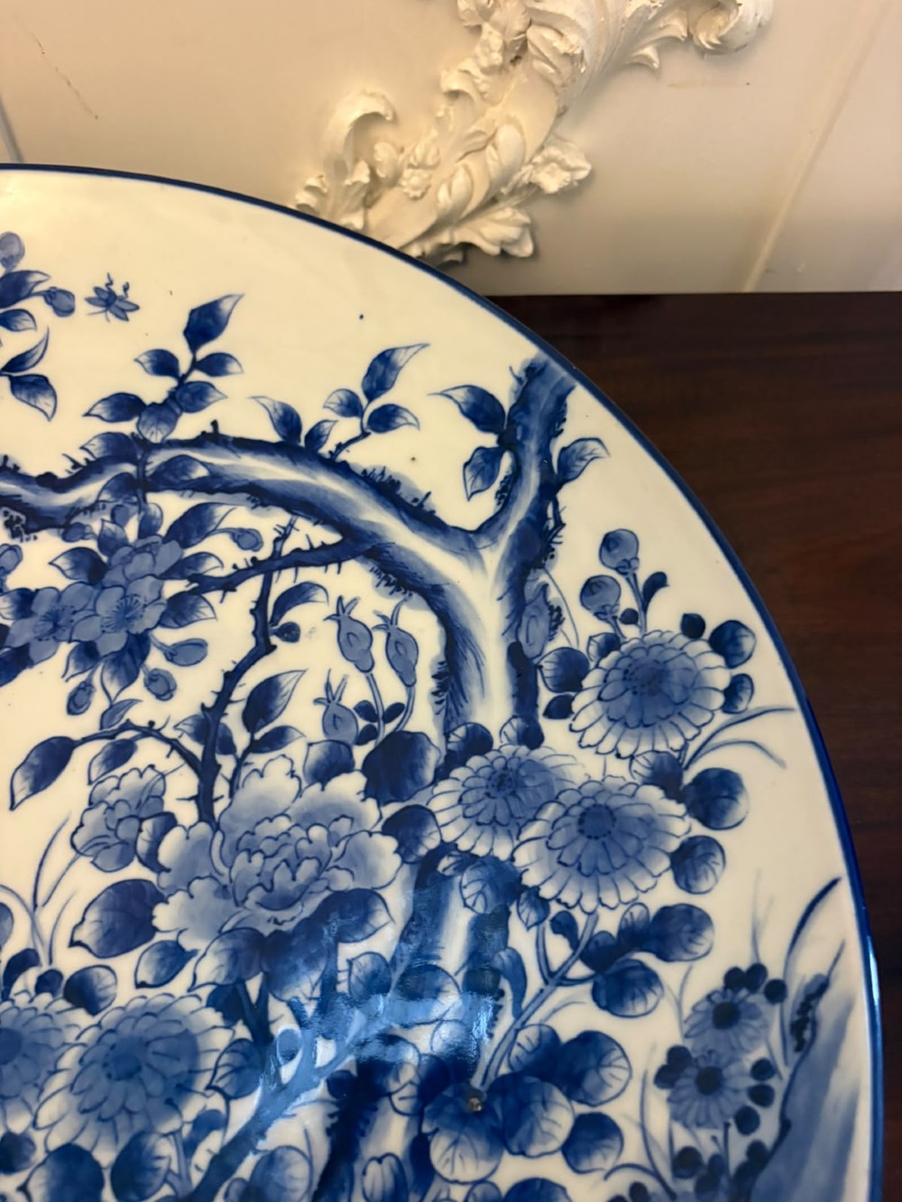 A pair of large circular blue and white Chinese porcelain chargers decorated with hand-painted birds and flowering branches. View XI