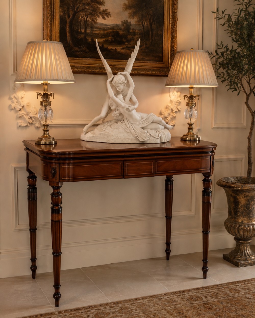 An antique Georgian mahogany fold-over card table featuring turned legs and subtle inlay stringing. View III