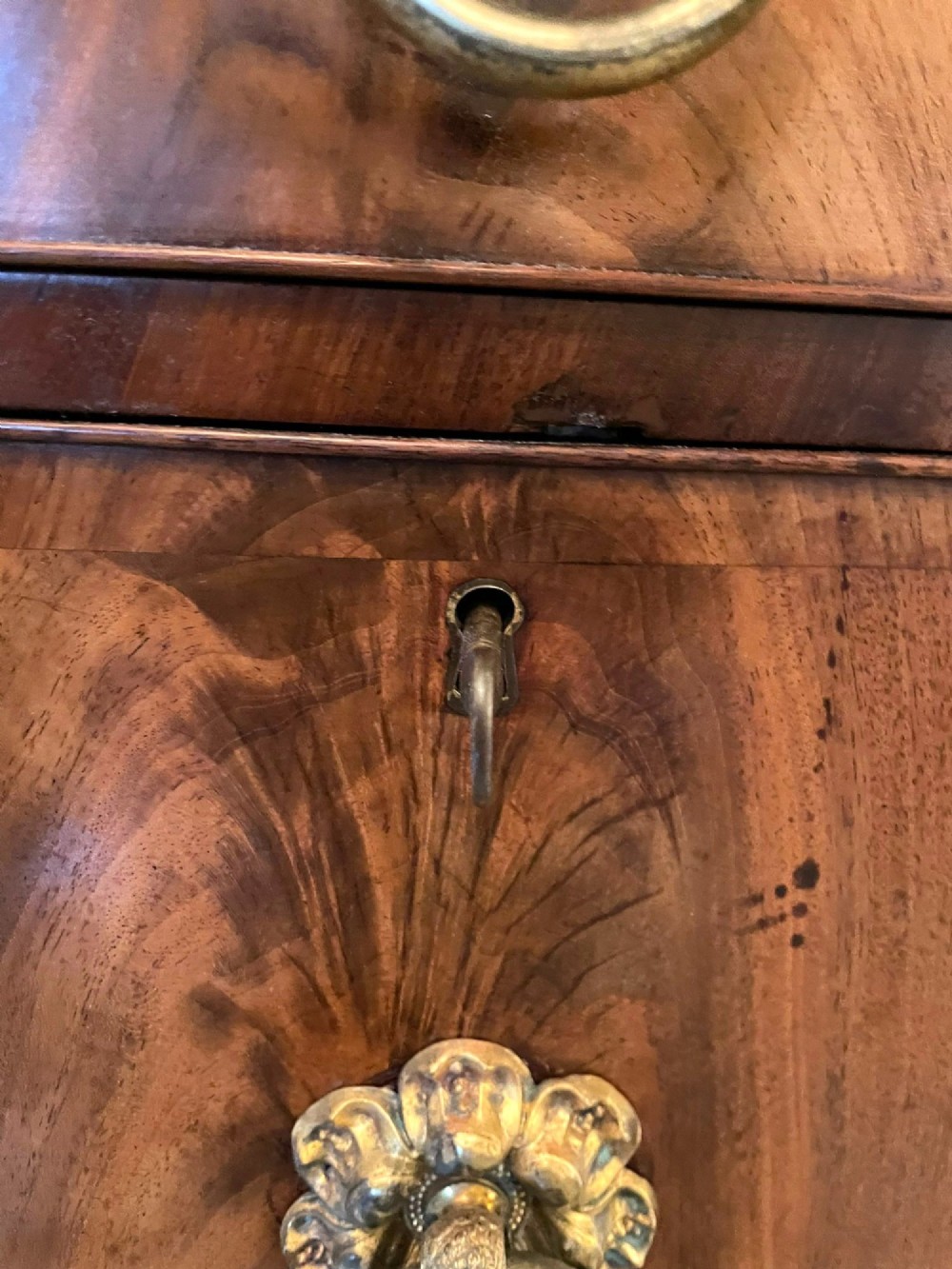 An antique Regency mahogany secretaire sideboard featuring twin pedestals, multiple drawers with brass ring pulls, and a scrolled backboard gallery. View X