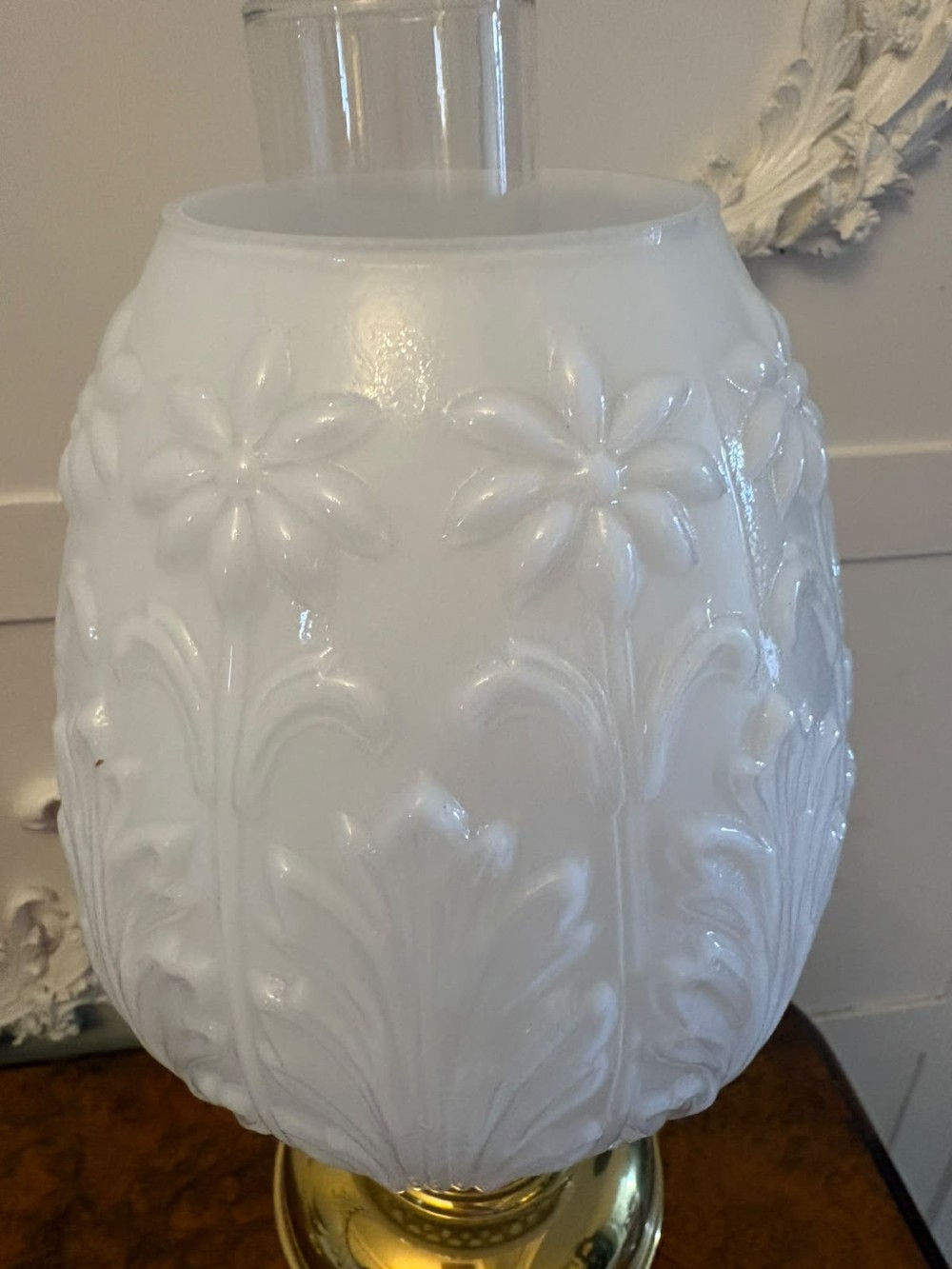 A near pair of Edwardian brass oil lamps featuring moulded white opaline glass shades and clear glass chimneys. View III