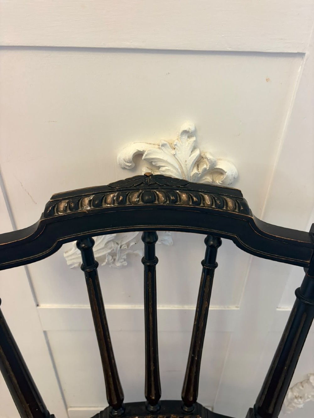 A set of four antique Victorian side chairs featuring ebonised black frames with turned spindle backrests, gilt details, turned front legs, and terracotta patterned upholstered seats. View X