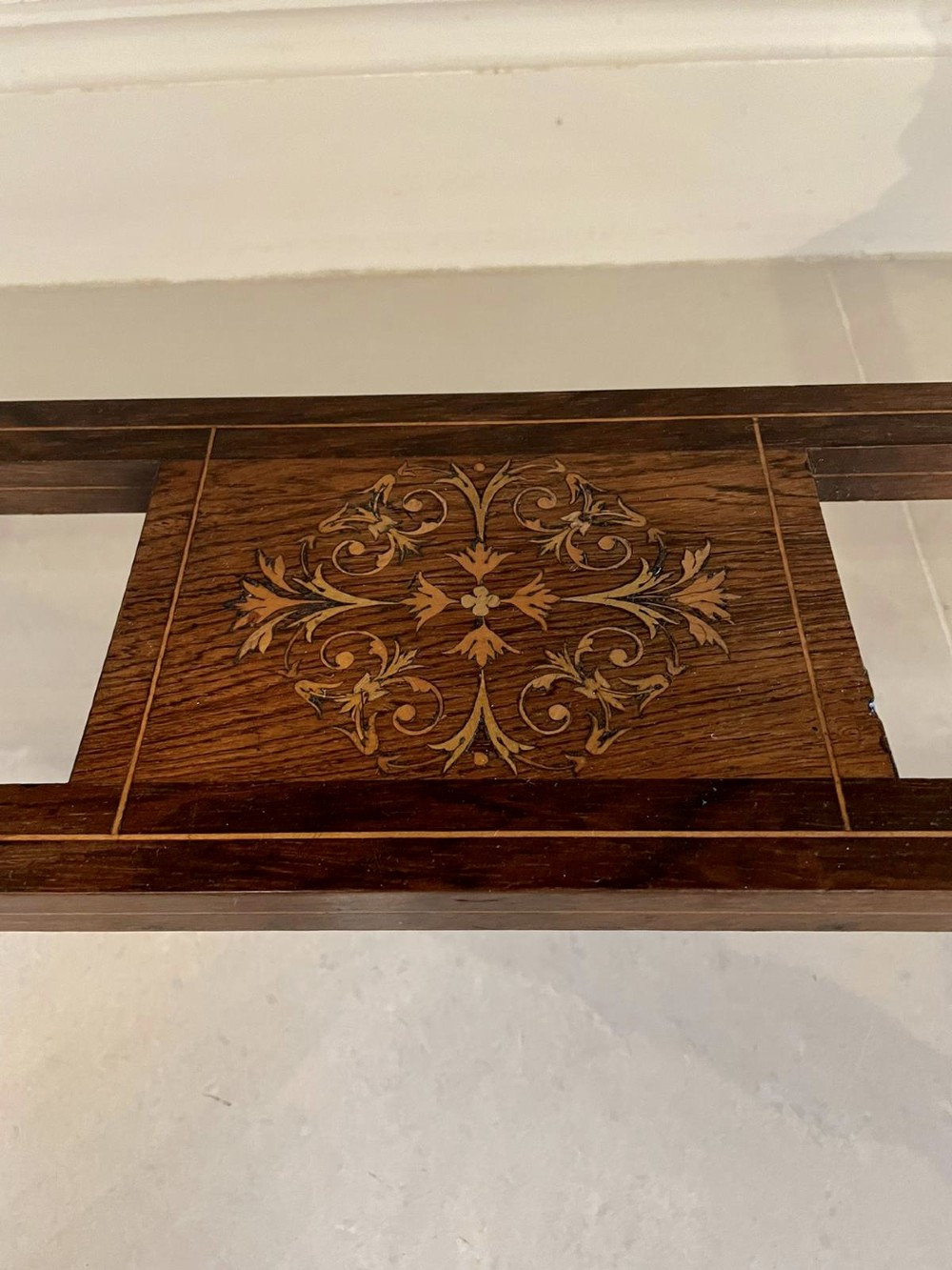An antique Victorian dark rosewood writing desk featuring decorative floral marquetry inlays, turned legs, and an upper superstructure with twin glazed cabinets and an arched mirror. View II