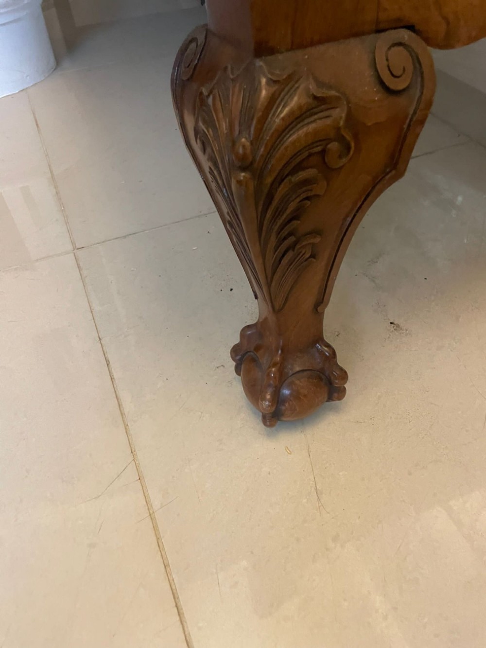 A pair of antique burr walnut single beds featuring high arched headboards, carved shell detailing on the aprons, and scroll-topped footposts. View XI