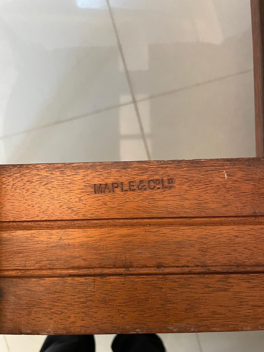 An antique burr walnut sideboard featuring quarter-veneered panel doors, carved edge mouldings, drawers with wooden knobs, and cabriole legs. View V
