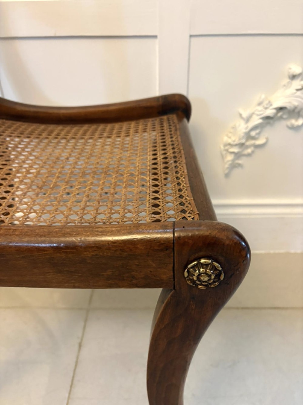 A set of six dark mahogany Regency dining chairs featuring rope-twist top rails, curved sabre legs, and woven cane seats. View X