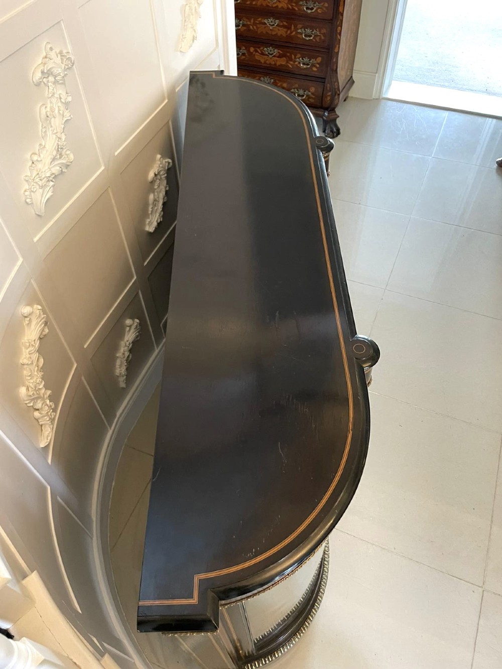 An ebonised nineteenth-century French credenza featuring amboyna wood inlays, gilt-bronze mounts, curved glass door cabinets, and a central painted porcelain plaque. View VIII