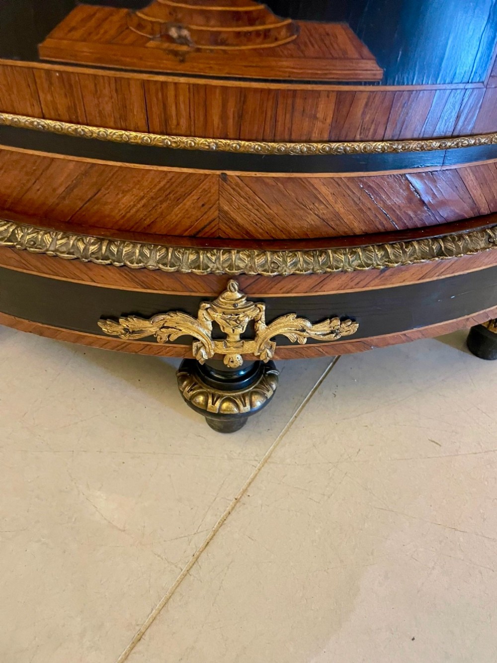 A French Louis XVI style corner cabinet featuring a bow-front door with floral wood marquetry inlay, gilt bronze mounts, and a fitted white marble top. View VI