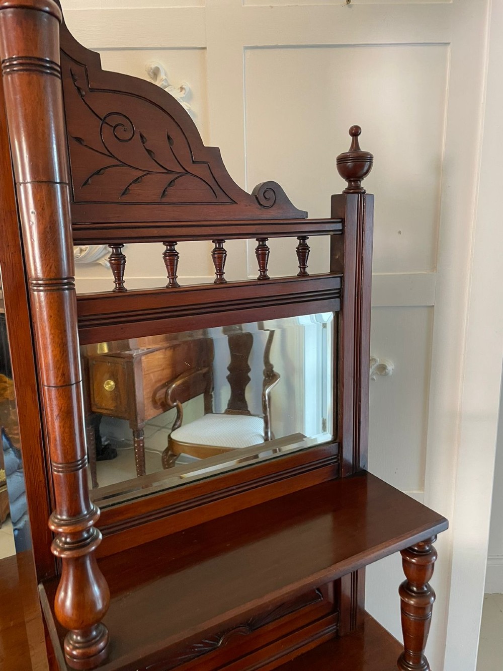A carved walnut Victorian mirror-back sideboard featuring turned columns, carved fan panels, multiple mirrors, and brass drawer handles. View II