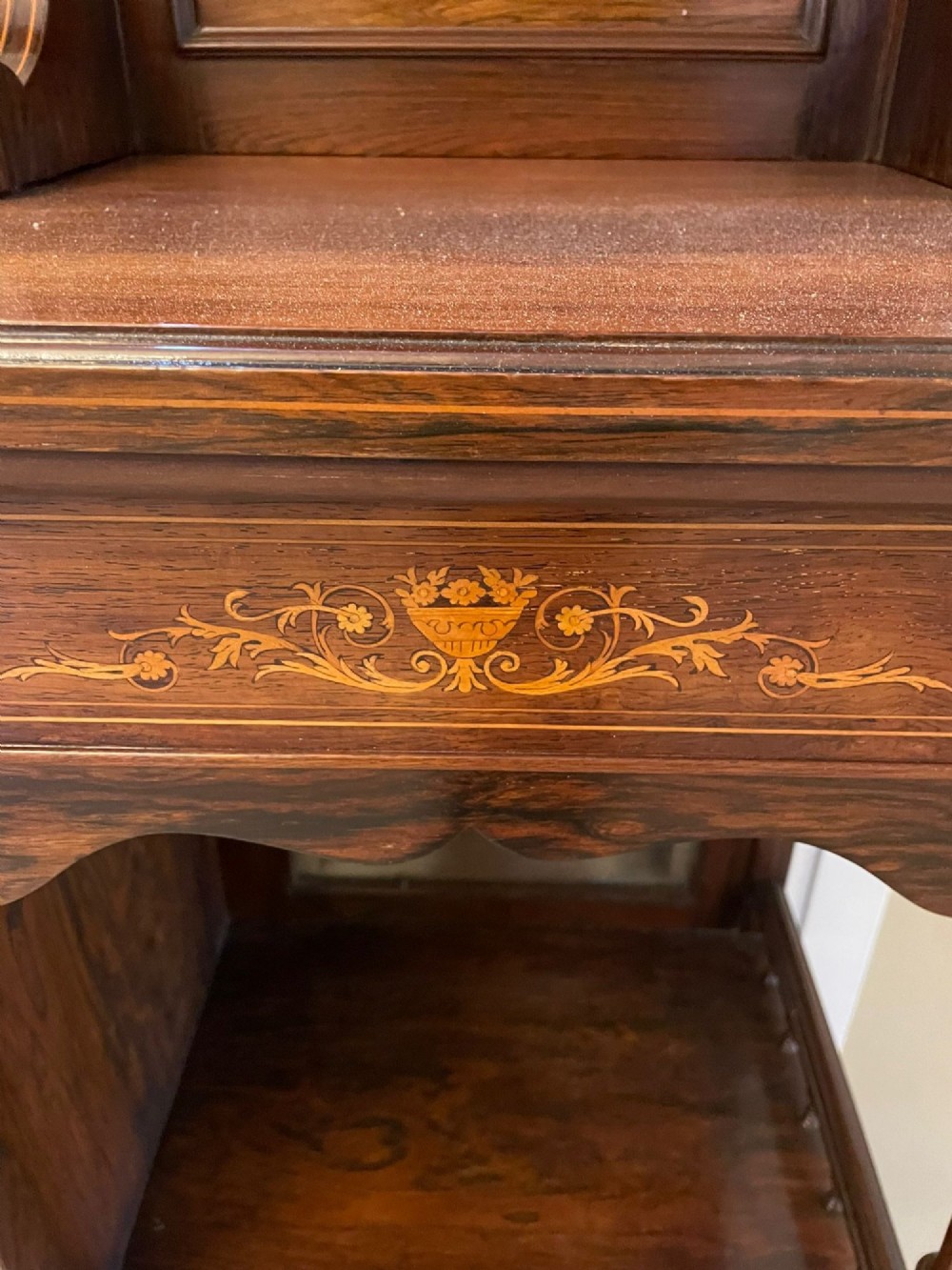 An antique Victorian dark rosewood side cabinet featuring intricate floral inlay, multiple bevelled mirror sections, open shelving, and a central cupboard door. View XIII