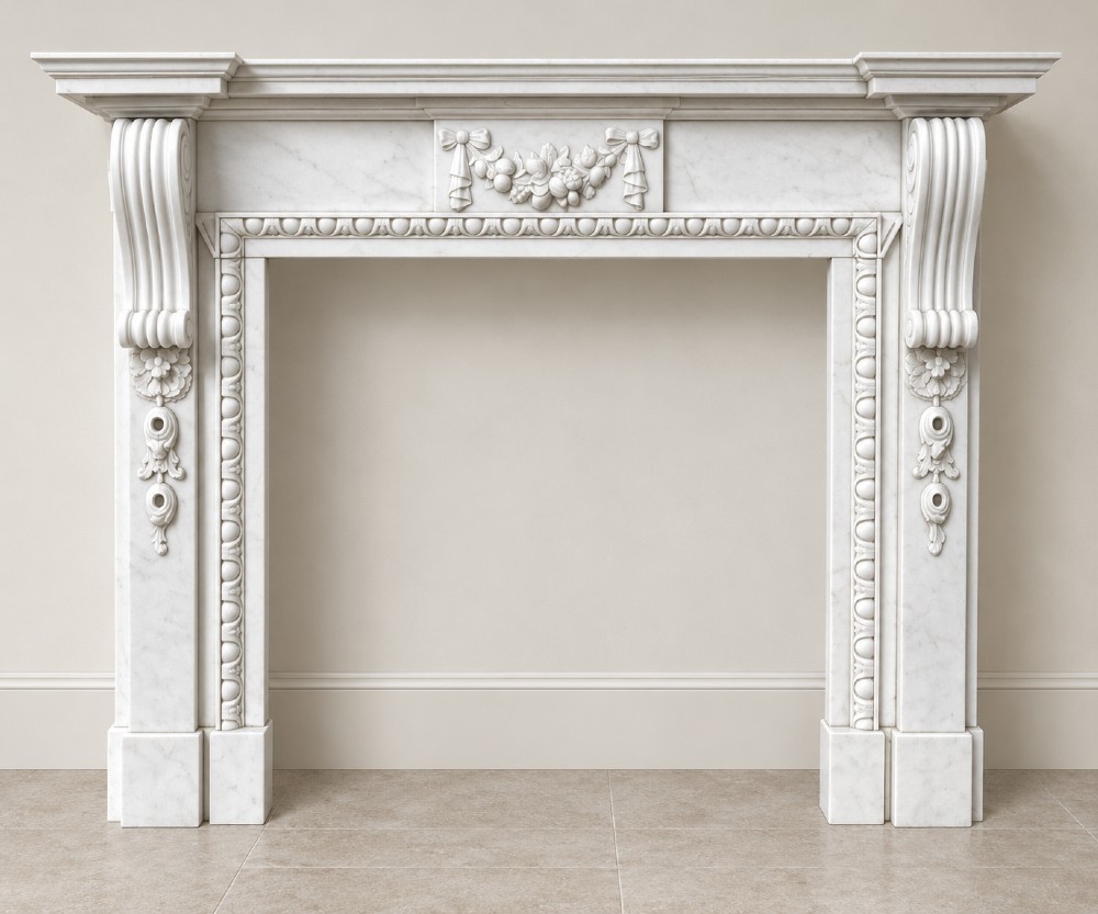 A pair of carved white marble Edwardian fireplace surrounds featuring fruit swags, ribbon bow motifs, and scrolled side brackets. View II