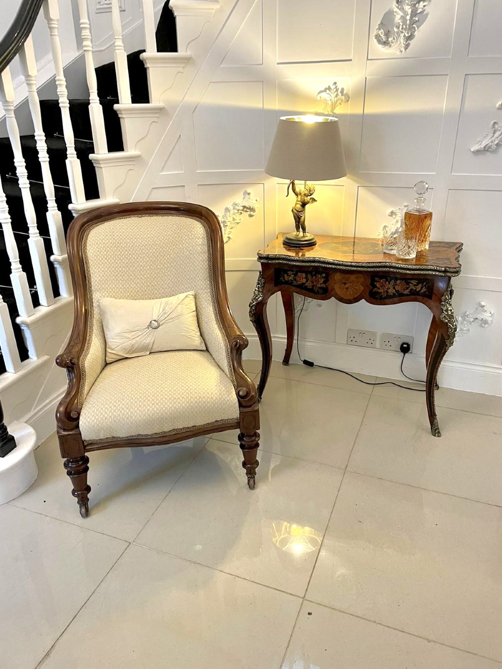 A French Rococo style kingwood card table featuring floral marquetry inlays, gilt-bronze ormolu mounts, and curved cabriole legs. View II