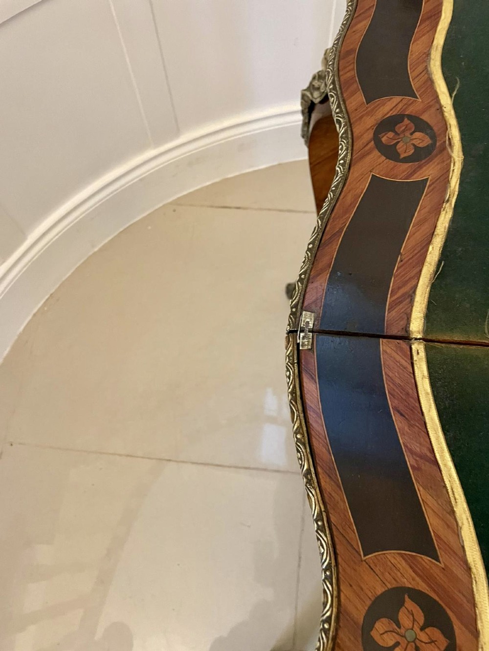 A French Rococo style kingwood card table featuring floral marquetry inlays, gilt-bronze ormolu mounts, and curved cabriole legs. View VI