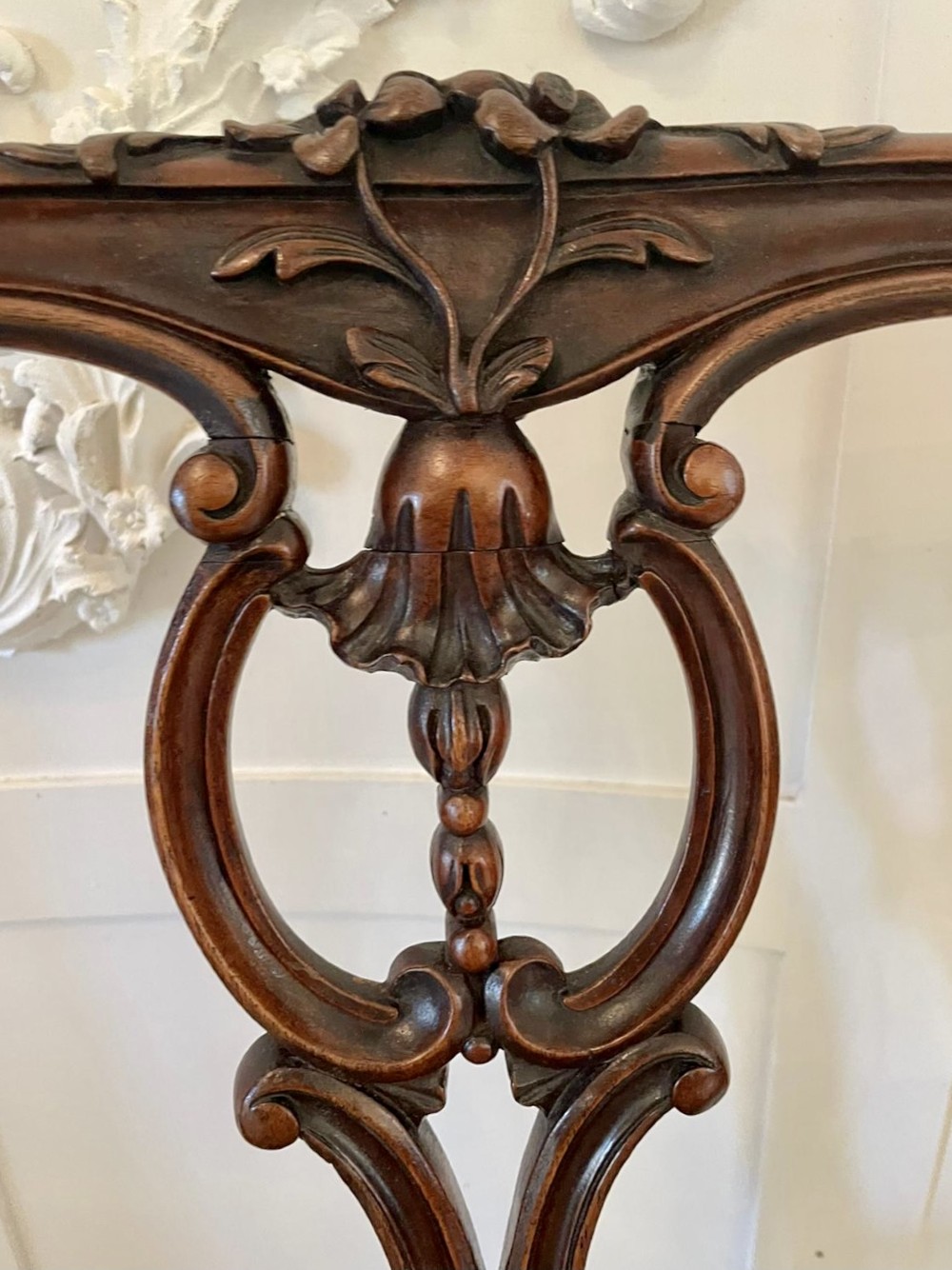 A set of four Victorian French carved walnut side chairs featuring openwork backrests and button-upholstered sage green fabric seats on cabriole legs. View XV