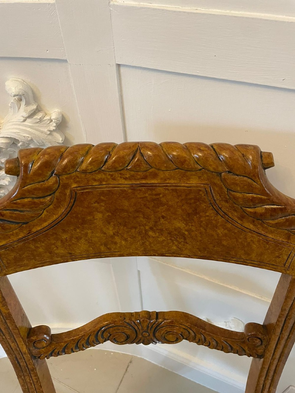 A set of eight antique Regency style dining chairs featuring decorative faux birds eye maple painted finishes and striped fabric seats. View II