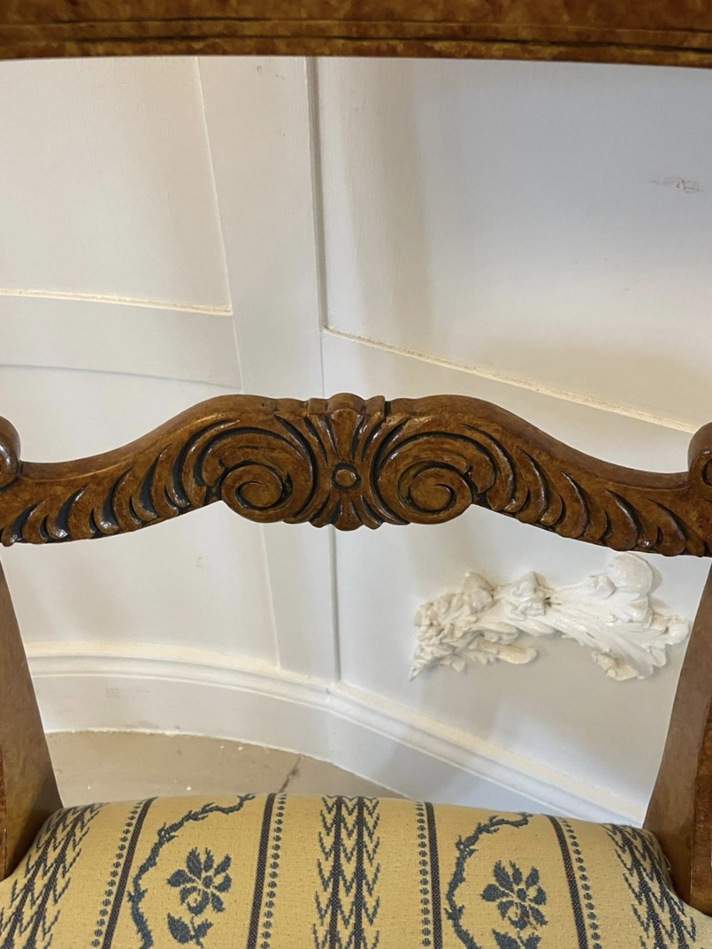 A set of eight antique Regency style dining chairs featuring decorative faux birds eye maple painted finishes and striped fabric seats. View X