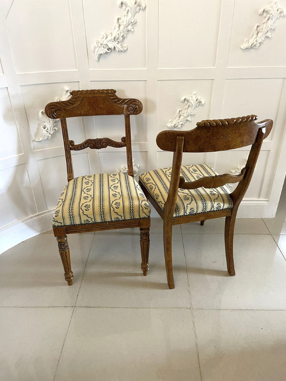 A set of eight antique Regency style dining chairs featuring decorative faux birds eye maple painted finishes and striped fabric seats. View XIV