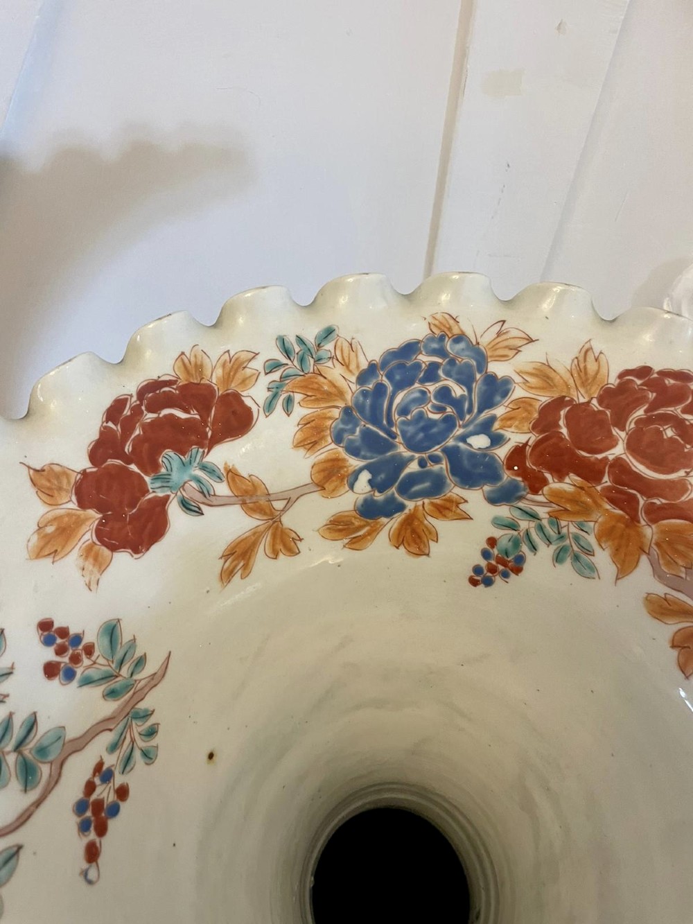 A tall 19th-century Japanese Imari porcelain floor-standing vase featuring polychrome enamel figurative scenes, floral motifs, and a fluted frilled rim. View IX