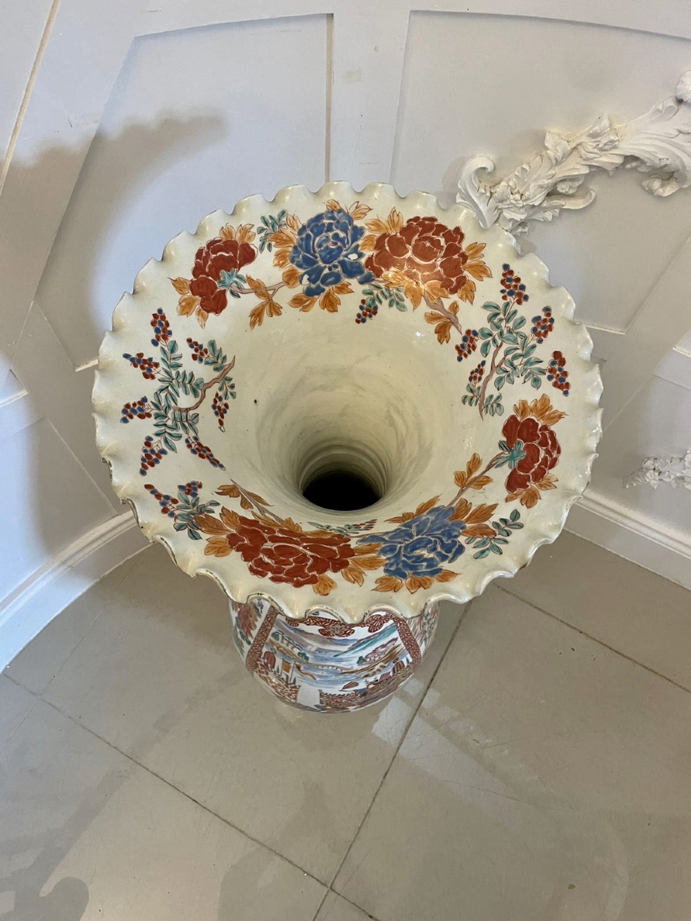 A tall 19th-century Japanese Imari porcelain floor-standing vase featuring polychrome enamel figurative scenes, floral motifs, and a fluted frilled rim. View XI