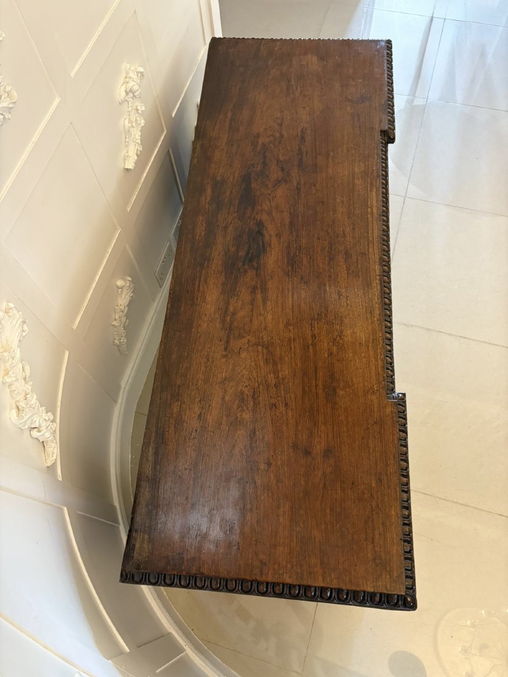 A Victorian burr walnut credenza featuring a central door with a hand-painted porcelain portrait plaque flanked by two curved glass display cupboards and gilt-brass mounts. View II