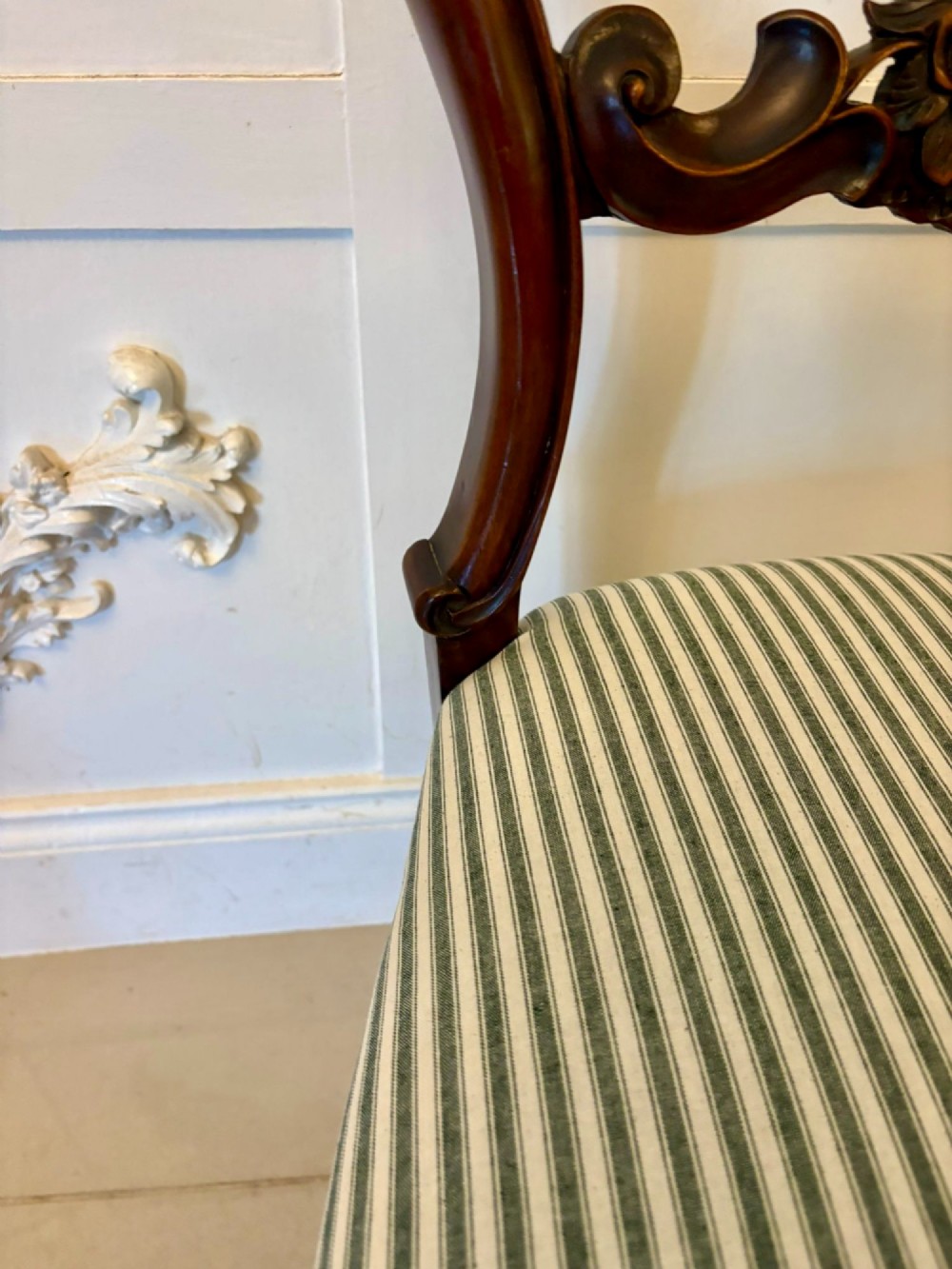 Set of six antique Victorian mahogany dining chairs featuring carved balloon backrests, cabriole front legs, and green-and-white striped fabric seats. View VII
