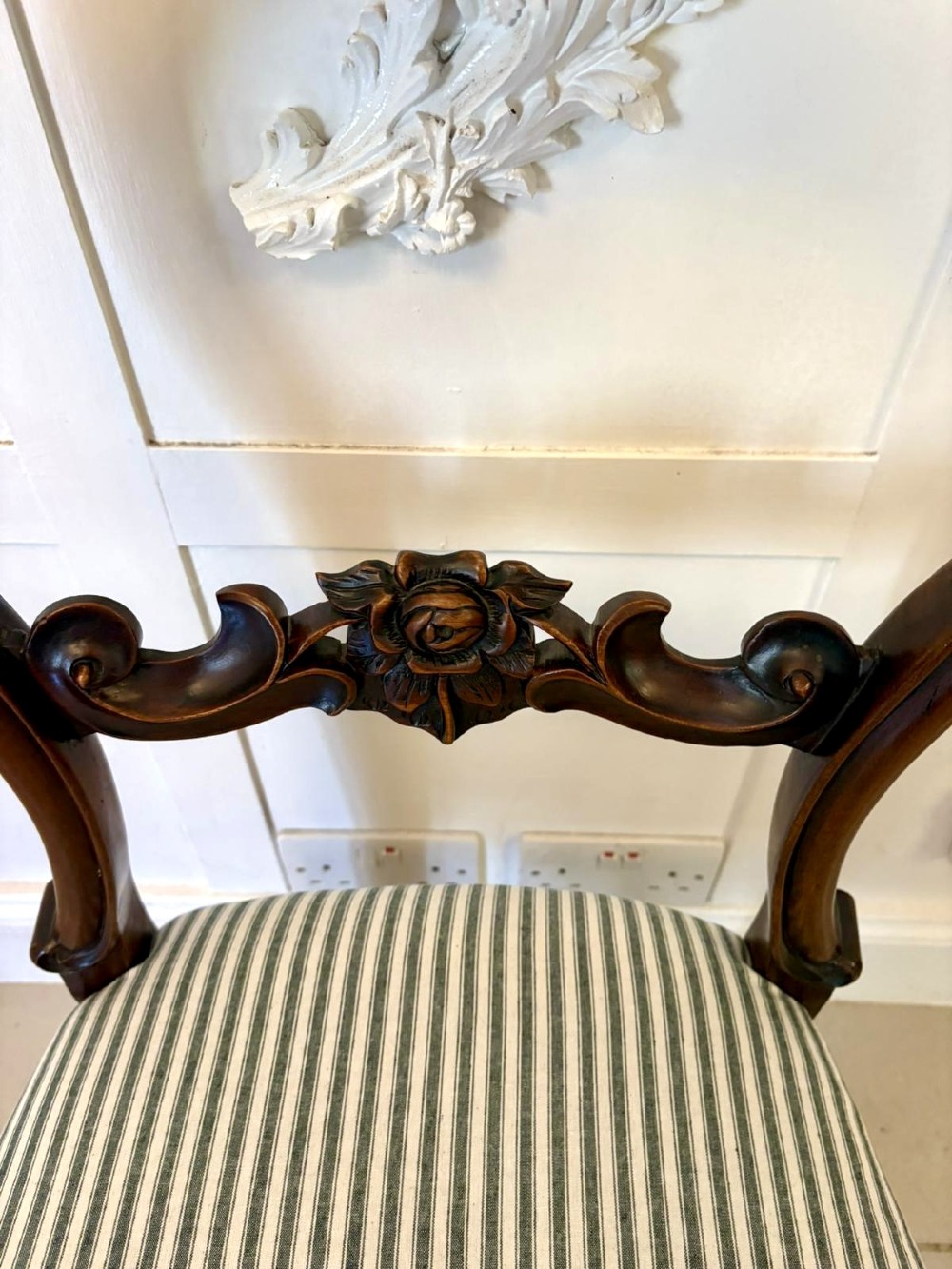 Set of six antique Victorian mahogany dining chairs featuring carved balloon backrests, cabriole front legs, and green-and-white striped fabric seats. View X