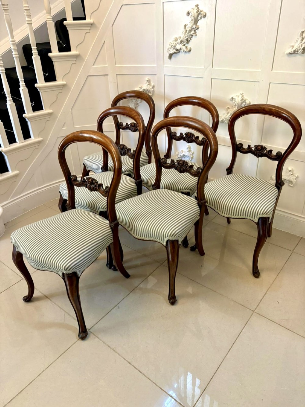 Set of six antique Victorian mahogany dining chairs featuring carved balloon backrests, cabriole front legs, and green-and-white striped fabric seats. View XIII