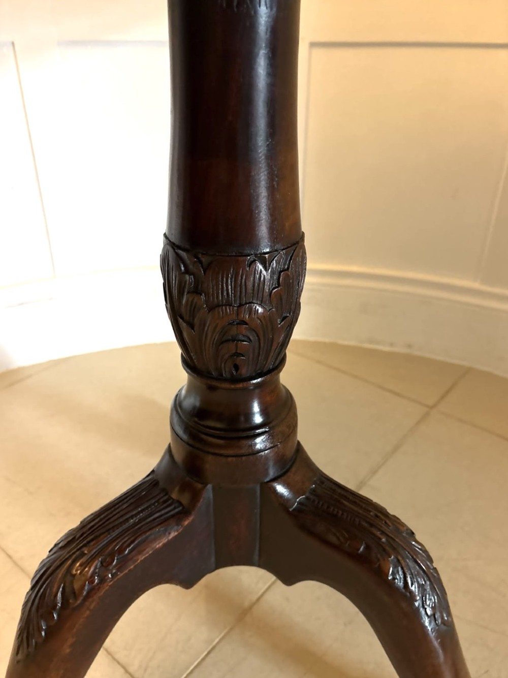 A mahogany George III style tilt-top centre table featuring a scalloped piecrust edge, central pedestal, and tripod cabriole legs with claw and ball feet. View VI