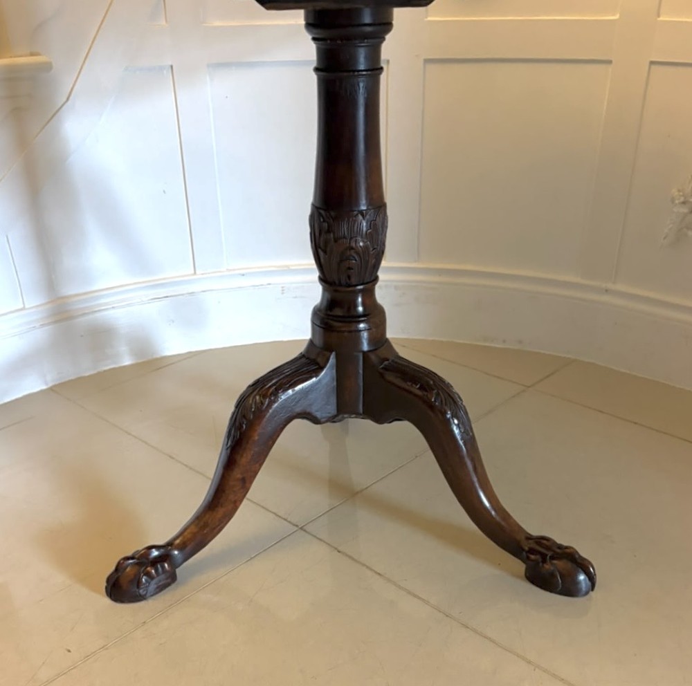 A mahogany George III style tilt-top centre table featuring a scalloped piecrust edge, central pedestal, and tripod cabriole legs with claw and ball feet. View VII