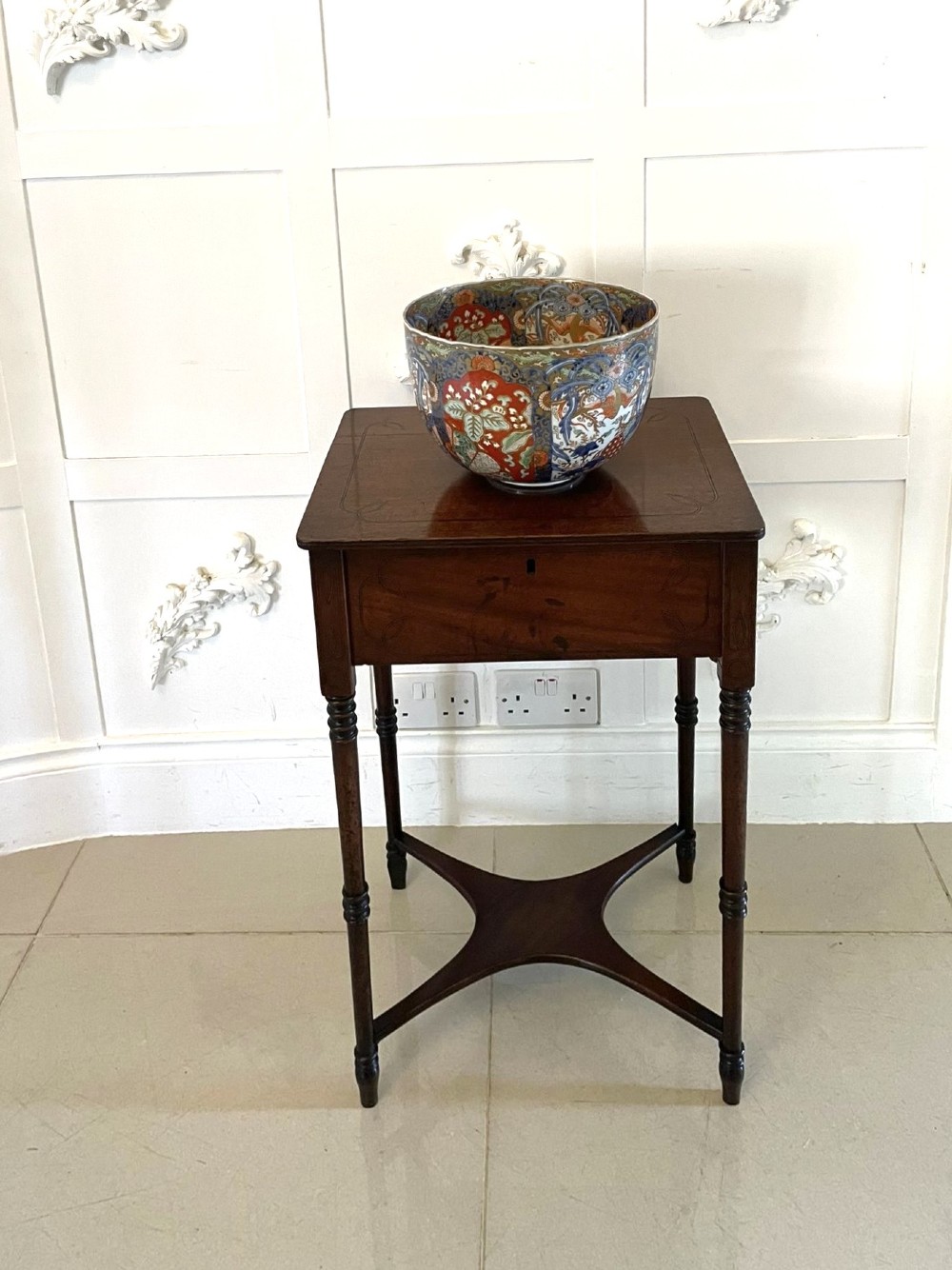 A square Regency mahogany lamp table with boxwood inlay, slender turned legs, and a curved X-form lower stretcher. View VI