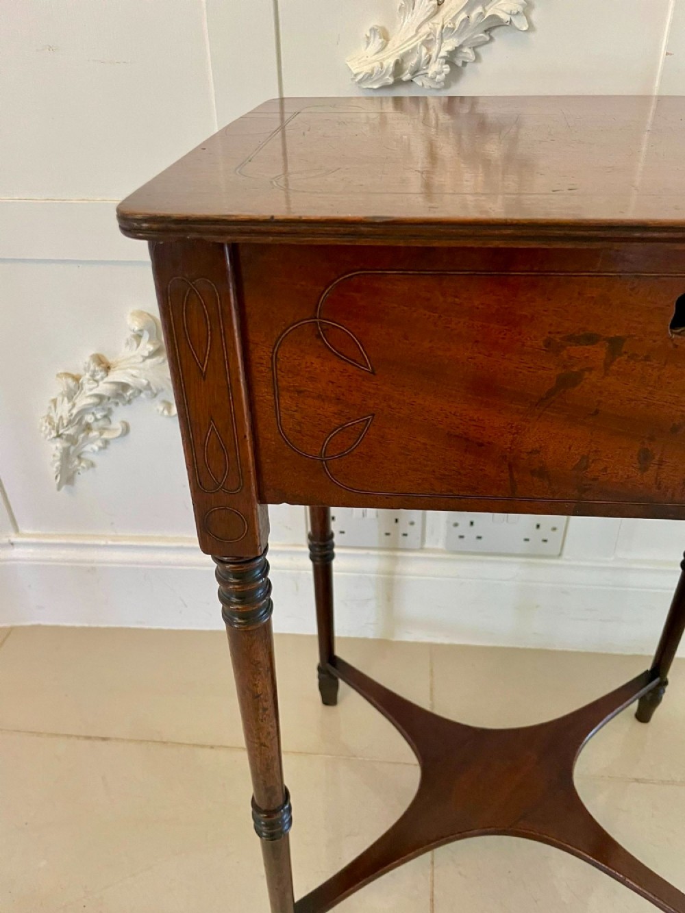 A square Regency mahogany lamp table with boxwood inlay, slender turned legs, and a curved X-form lower stretcher. View X