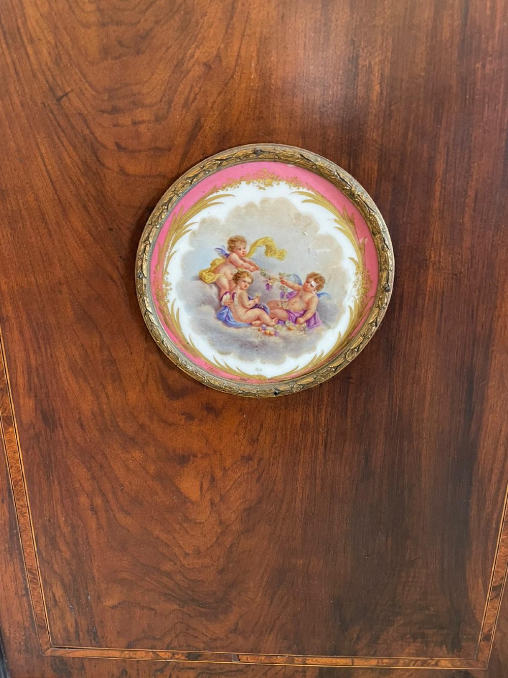 A Victorian dark walnut floor-standing corner cabinet featuring fine marquetry inlay and a central oval hand-painted porcelain plaque. View II